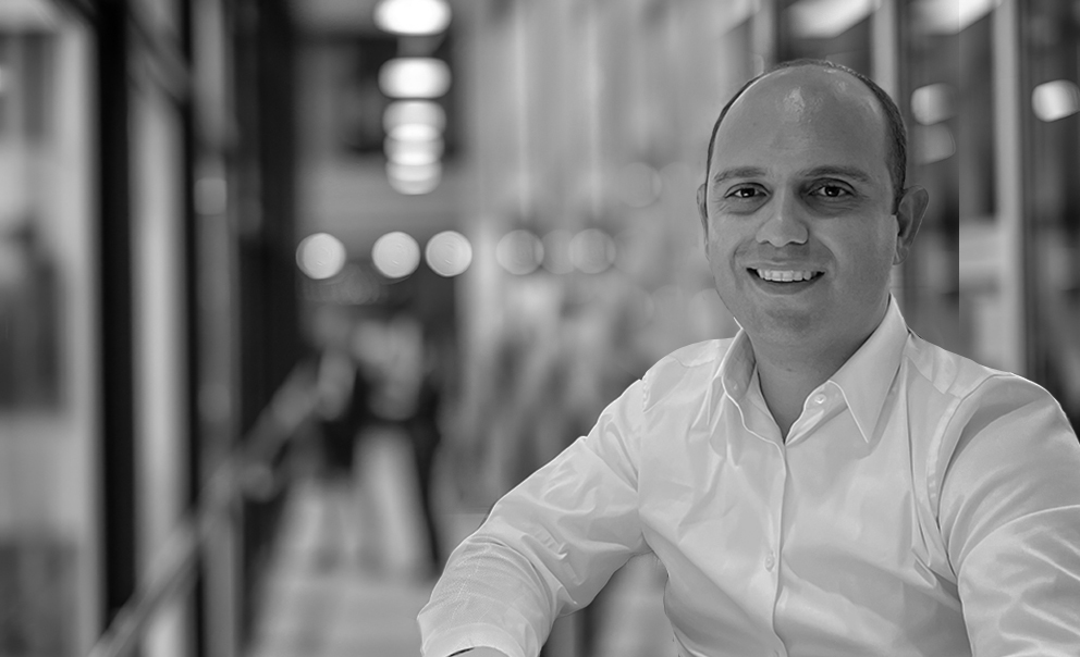 portrait of successful senior businessman consultant looking at